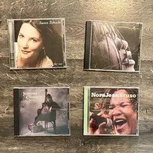 Set of 4 Music CDs
